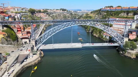 A camera drone flies sidewise over the Douro River Stock Footage 202061211