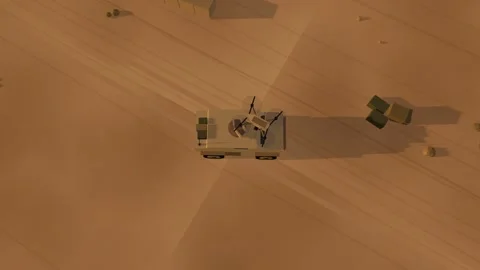 Camera drone releases a munition over a patrol vehicle at golden hour Видео 342368040