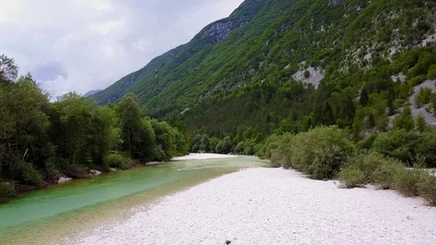 Camera elevates over Soca river valley 스톡 동영상 80644481