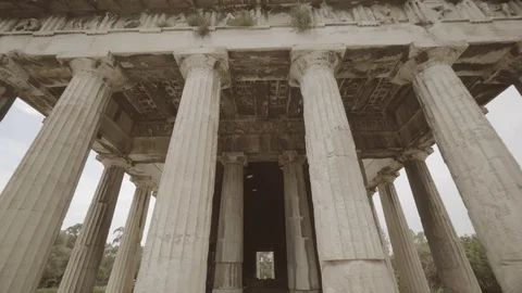 The camera enters a portico supported by Ionic columns. Stock Footage 91889787