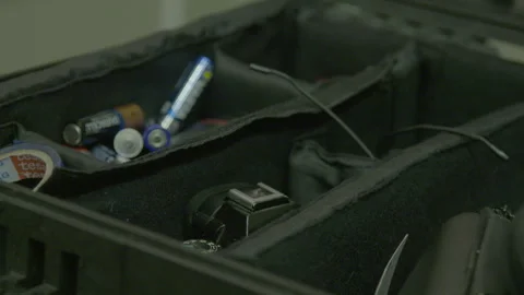 Camera Equipment and Accessories Inside Padded Case Stock Footage 342558152