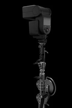 Camera external flash speedlight on stand isolated on black background. Stock Illustration