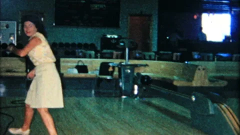 Camera films woman bowling at local alley 1950s family home movie 6216 Stock Footage 142669401