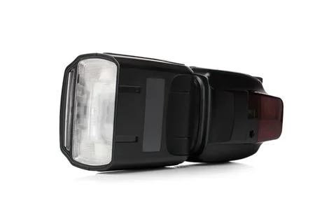 Camera flash unit with black and red design on white background Stock Photos