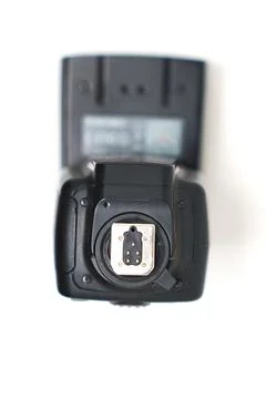Camera flash unit with a hot shoe mount for photography enthusiasts Stock Photos
