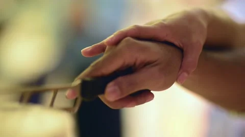 Camera Flashes While Couple Cut Their Wedding Cake.mp4 Stock Footage 50740490