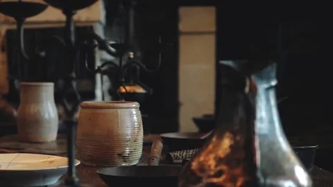 Camera flays across the dining table in the medieval castle.Vintage wooden table Stock Footage 140374835