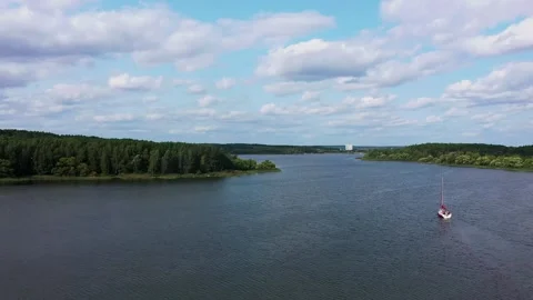 The camera flies along the river at the height of a bird's flight Video stock 139917343