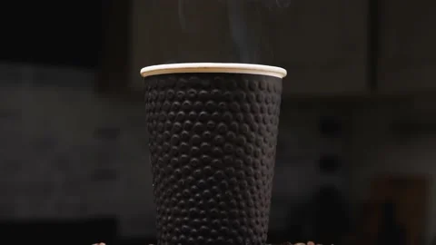 The camera flies around a black paper cup of coffee. Parallax effect Stock-Footage 226317906
