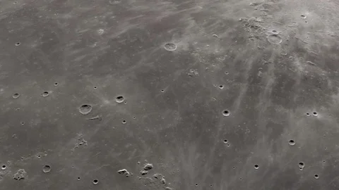 Camera flies around a craters in the Moon in Apollo 17 landing site. Elements of Stock Footage 90409597