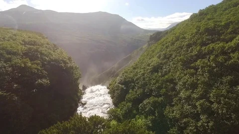 Camera flies away from the waterfall to the bottom Stock Footage 72653932