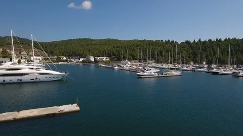 The camera flies away from the yachts Stock Footage 124289672
