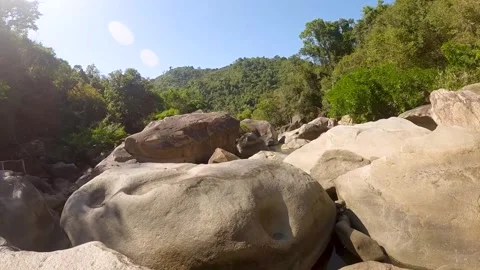 The camera flies close to the rocks on the waterfall Video stock 240720735