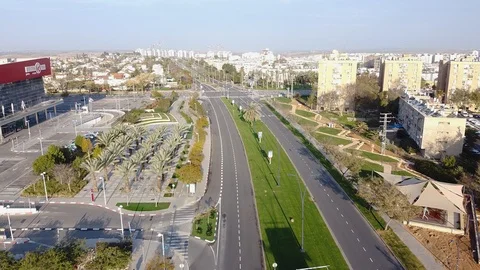 Camera flies on direction of the crossroad in Beer-Sheva Stock Footage 125483679