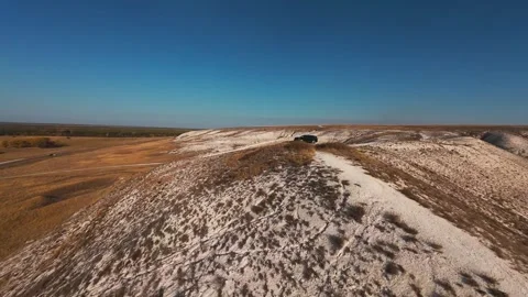 The camera flies low over the chalk mountains Stock Footage 288195207