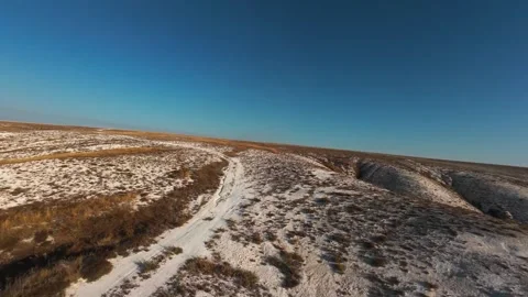 The camera flies low over the chalk mountains Stock Footage 288195208