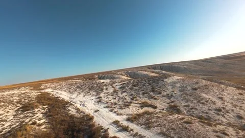 The camera flies low over the chalk mountains Stock Footage 288195213