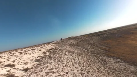 The camera flies low over the chalk mountains Stock Footage 288195214