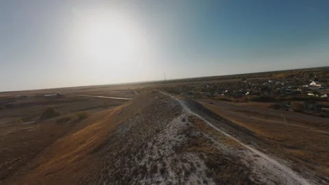The camera flies low over the chalk mountains Stock Footage 288195254