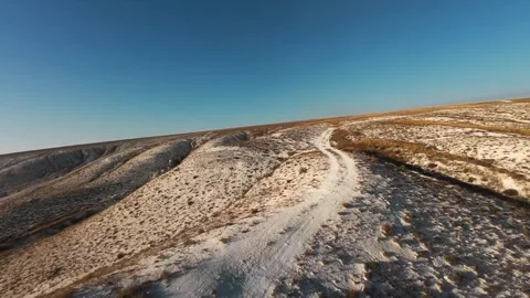 The camera flies low over the chalk mountains Stock Footage 288195256