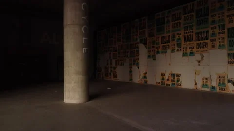 The camera flies near a large column into a dark corner of the room Stock Footage 249655145