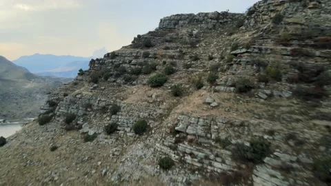 The camera flies next to the rock Stock Footage 171295712