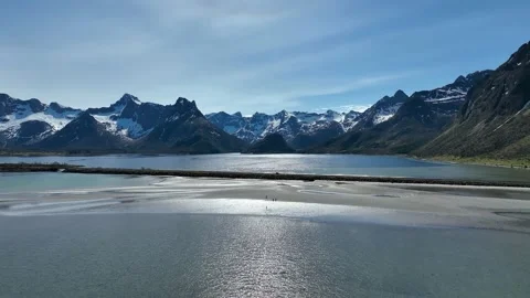 The camera flies to the ocean from the beach in the mountains in 4k Stock Footage 224019067