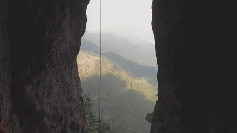 Camera flies out of the cave Stock-Footage 104107175