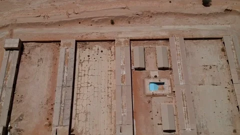 Camera flies over the abandoned camp in Khafs Daghrah Stock Footage 153521879