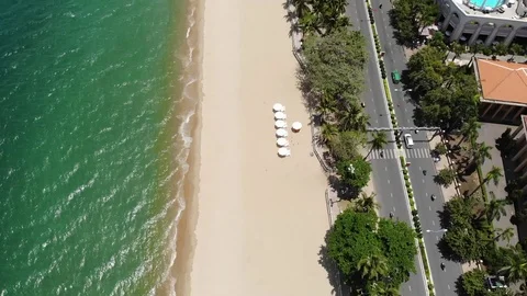 The camera flies over the beautiful beach Stock Footage 100187193