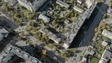 The camera flies over the city looking down and then raises the eye to the Stock Footage 96345250