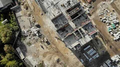 The camera flies over the construction of a high-rise building. Stock Footage 96354772