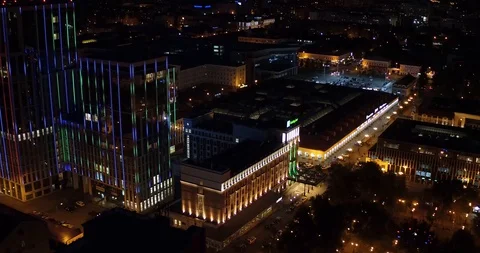 The camera flies over the hotel night in the centre of the city Stock Footage 129309867