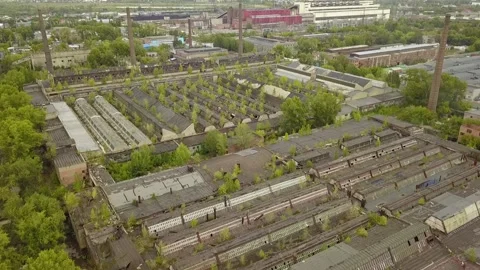 The camera flies over a huge territory of abandoned production Stock Footage 139601783