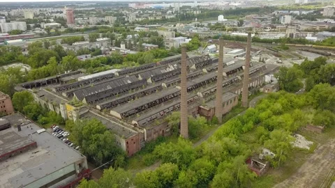 The camera flies over a huge territory of abandoned production Stock Footage 139601846
