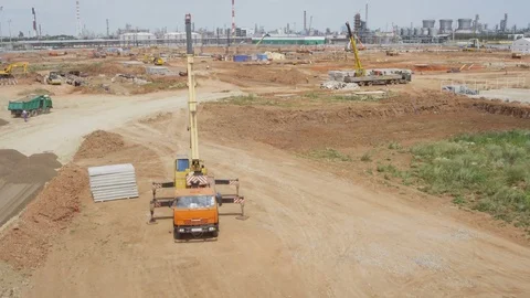 Camera Flies over Large Plant Construction Territory Stock Footage