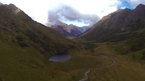 Camera flies over a mountain lake Video stock 68169361