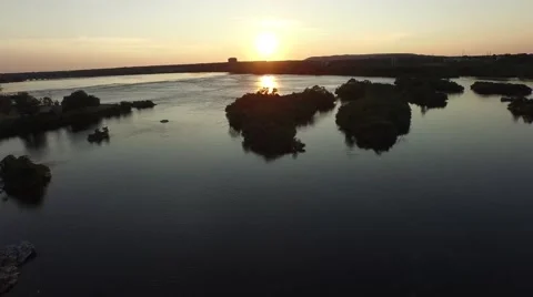 Camera flies over river and islands at sunset in Canada. 動画素材 52303775