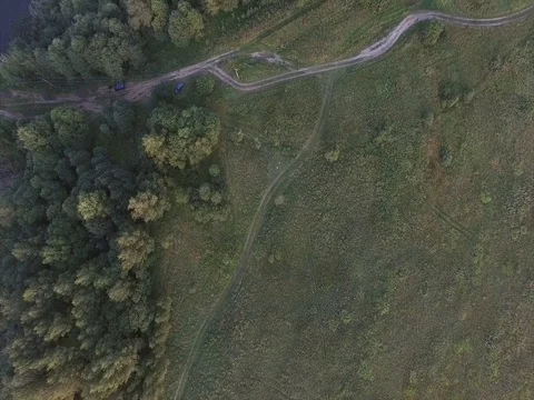 The camera flies over the river at the stone bridge. You can see the streets Stock Footage 79425405