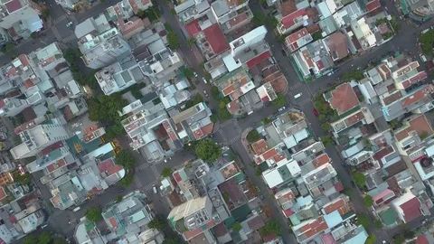 Camera flies over the roofs of Nha Trang overlooking the road Stock Footage 119008392