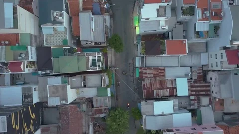 Camera flies over the roofs of Nha Trang overlooking the road Stock Footage 119016683