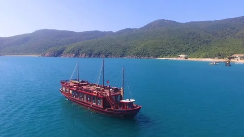 The camera flies over the ship into the sea Stock Footage 91617284