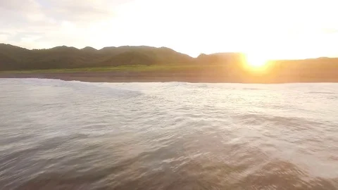 The camera flies over the waves. Pacific Ocean Stock Footage 72657276