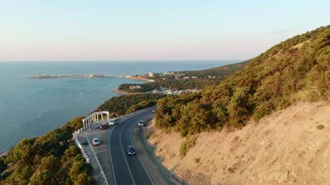 The camera flies over winding road Stock Footage 172437998