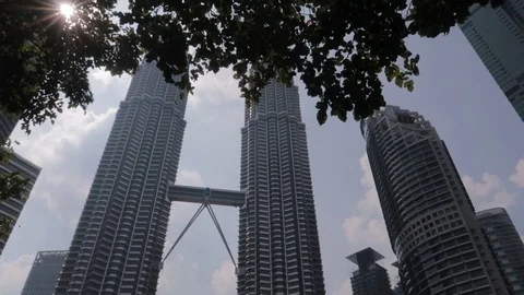 The camera flies overlooking the Petronas Towers in Kuala Lumpur. Stock Footage 116125554