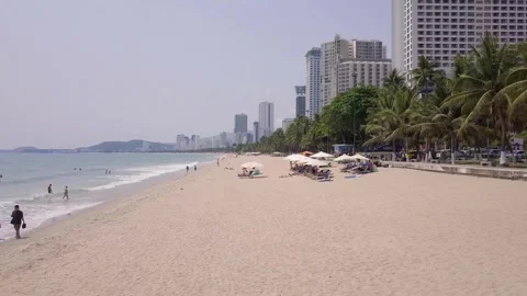 The camera flies slowly over the beach of Nha Trang Stock-Footage 275895358