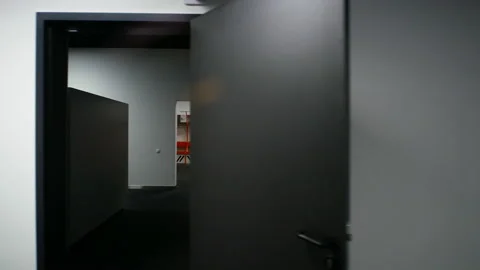 The camera flies through the doorway in front of the sports locker room. 스톡 동영상 171594308