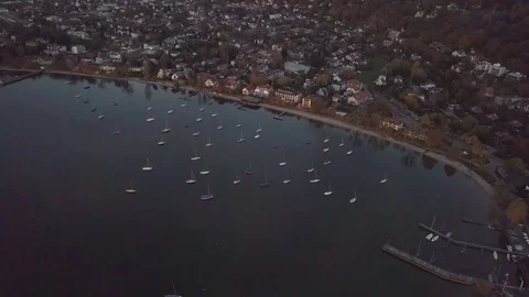 Camera flight above the lake with a lot of boats - Aerial Stock Footage 83773909