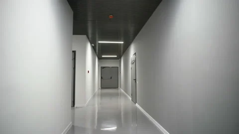 Camera flight back along the black and white service corridor 스톡 동영상 171593499
