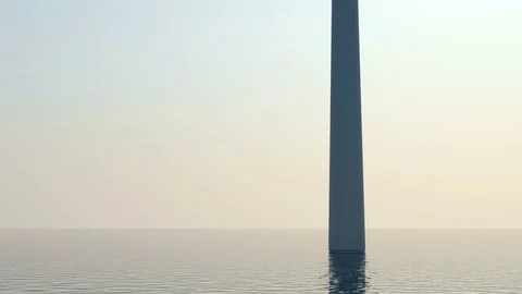 Camera Flight Between of Modern Wind Turbines in the Sea Stock Footage 70127834